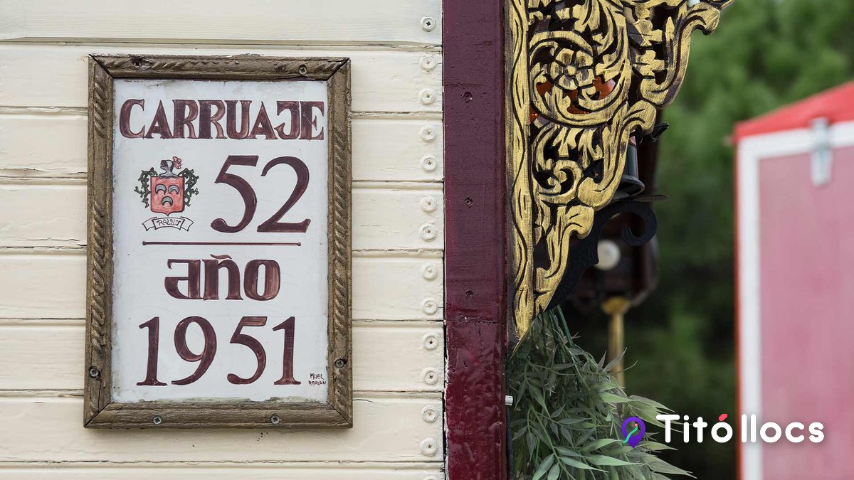 Rètol d'una caravana antiga del circ que indica carruatge 52, de l'any 1951