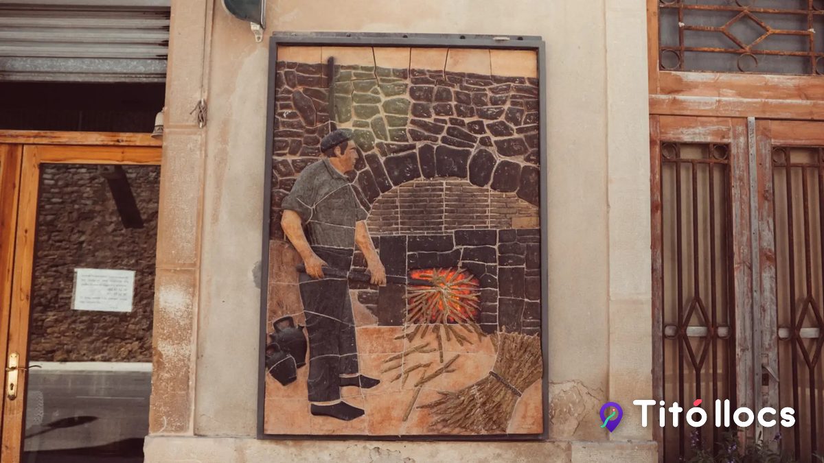 Mural ceràmic d'un cantirer davant del forn, obra de Magí Sambola, en una façana de Verdú